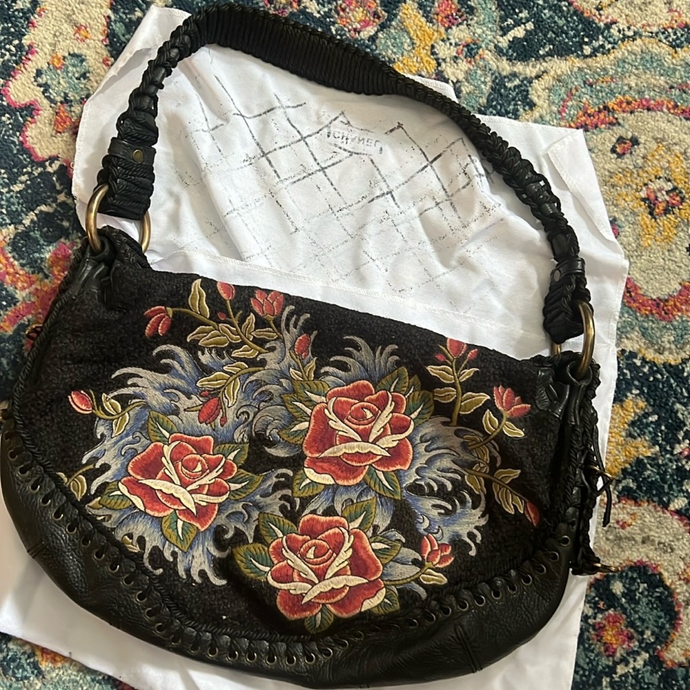 Vintage Isabella Fiori handbag with embroidered roses and leather.